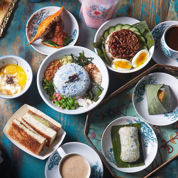 <h3 style="text-align: center;">Kopitiam</h3>

<p style="text-align: center;">An all-day Malaysian café with out-of-this-world nasi lemak, a rice dish topped with delicious fried anchovies, hard-boiled eggs, and homemade sambal.</p>

<p style="text-align: center;"><a class="overlay-link" href="/neighborhood-map#location_id=33">See on Map</a></p>
