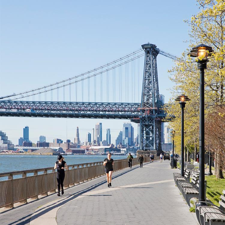 <h3 style="text-align: center;">East River Park</h3>

<p style="text-align: center;"> Kramer may have taken a swim here, but we’d suggest just soaking in the view of Brooklyn from the waterfront pathway. Not to mention all the tennis and basketball courts, football, soccer, and baseball fields—there’s plenty of room to play. </p>

<p style="text-align: center;"><a class="overlay-link" href="/neighborhood-map#category_id=4&location_id=42">See on Map</a></p>

