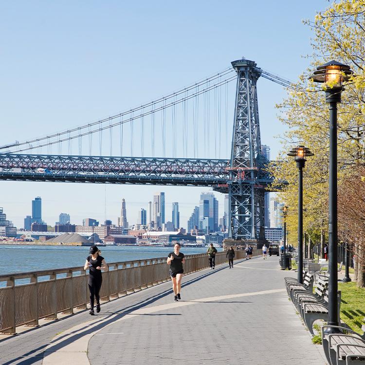 <h3 style="text-align: center;">East River Park</h3>

<p style="text-align: center;">Kramer may have taken a swim here, but we’d suggest just soaking in the view of Brooklyn from the waterfront pathway. Not to mention all the tennis and basketball courts, football, soccer, and baseball fields—there’s plenty of room to play. </p>

<p style="text-align: center;"><a class="overlay-link" href="/neighborhood-map#category_id=4&location_id=42">See on Map</a></p>
