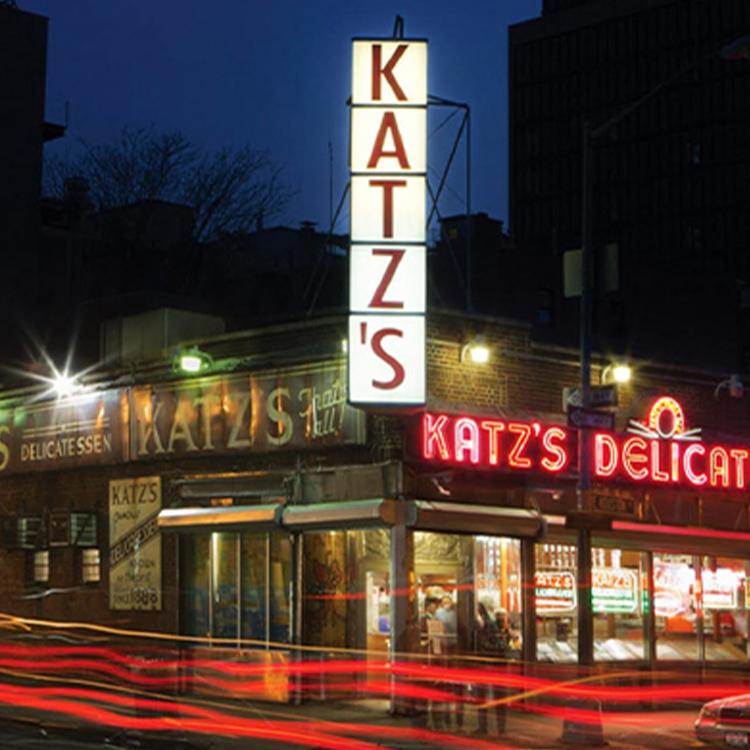 <h3 style="text-align: center;">Katz's Deli</h3>

<p style="text-align: center;">Needs no introduction. Pastrami sandwiches as big as your face and waiters who’ll tell it like it is. Stroll in at 11:30 a.m. if you don’t like waiting for lunch. </p>

<p style="text-align: center;"><a class="overlay-link" href="/neighborhood-map#category_id=3&location_id=22">See on Map</a></p>
